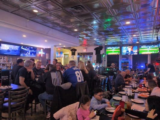 Bravo Pizzeria sports bar on a Saturday night with live music and a packed house